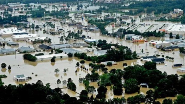 An arial photograph of a flooded neighborhood in Dnhamp Springs, La. Taken on 13 August 2016
